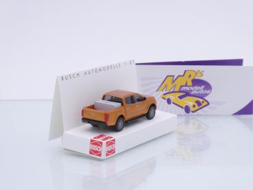 Preview: Busch 53720 # Nissan Navara Pick-Up mit Alukiste " goldmetallic " 1:87