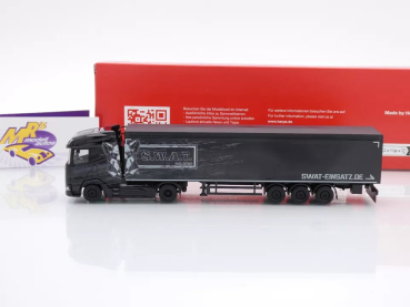 Preview: Herpa 317603 # DAF XG Schubboden-Sattelzug schwarz " SWAT Einsatz " 1:87