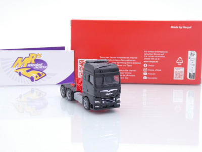 Preview: Herpa 313100-003 # MAN TGX GX 3-achs Zugmaschine mit Ladekran " schwarz " 1:87