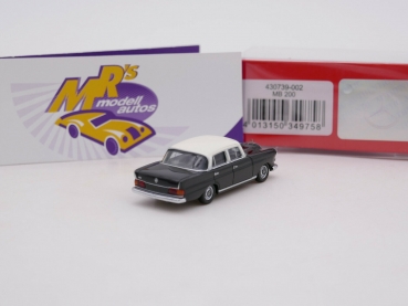 Preview: Herpa 430739-002 # Mercedes Benz 200 Heckflosse " schwarz-weiß " 1:87