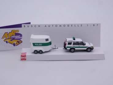 Preview: Busch 51936 # Land Rover Discovery mit Pferdeanhänger weiß-grün " Polizei " 1:87