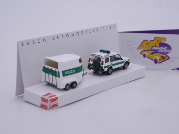 Preview: Busch 51936 # Land Rover Discovery mit Pferdeanhänger weiß-grün " Polizei " 1:87