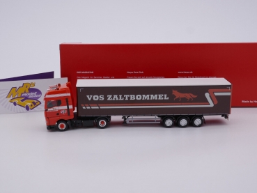 Preview: Herpa 315067 # MAN TGX GX Gardinenplanen-Sattelzug " VOS Zaltbommel " 1:87