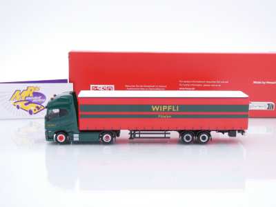 Preview: Herpa 319171 # Volvo FH GL XL Electric Gardinenplanen-Sattelzug " Wipfli Schweiz " 1:87