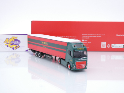 Preview: Herpa 319171 # Volvo FH GL XL Electric Gardinenplanen-Sattelzug " Wipfli Schweiz " 1:87