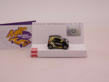 Preview: Busch 50721 # Smart Fortwo Baujahr 2014 gelb-schwarz " Kärcher Center " 1:87