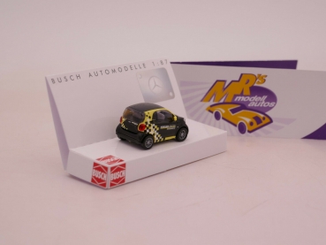 Preview: Busch 50721 # Smart Fortwo Baujahr 2014 gelb-schwarz " Kärcher Center " 1:87