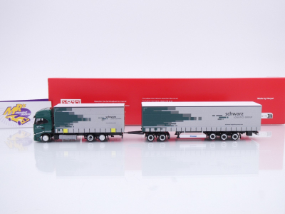 Preview: Herpa 319607 # Iveco S-Way Gardinenplanen-Hängerzug " Spedition Schwarz " 1:87