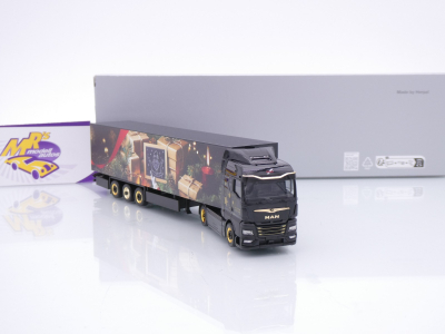 Preview: Herpa 319973 # MAN eTGX GM Koffer-Sattelzug " Weihnachtsmodell 2025 " 1:87