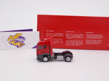 Preview: Herpa 314572 # MAN TGS TM 2-achs Zugmaschine mit Windleitblechen " rot " 1:87
