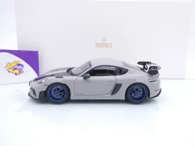 Preview: Norev 187253 # Porsche Cayman 718 982 GT4 RS Weissach Package Baujahr 2023 " Kreidegrau " 1:18