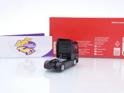 Preview: Herpa 320245 # MAN eTGX GM 2-achs Zugmaschine " schwarz " 1:87