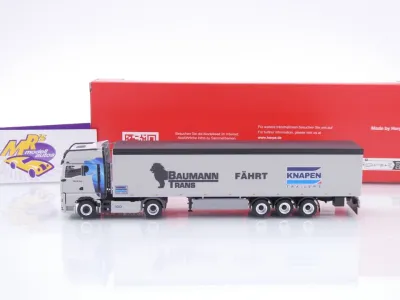 Preview: Herpa 320085 # MAN TGX GX Schubboden-Sattelzug " Baumann Trans / Knapen " 1:87