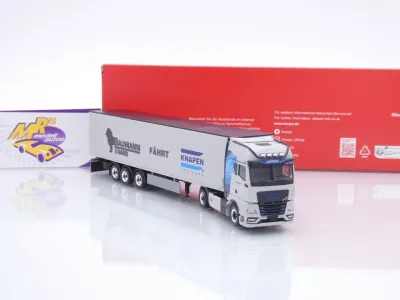 Preview: Herpa 320085 # MAN TGX GX Schubboden-Sattelzug " Baumann Trans / Knapen " 1:87