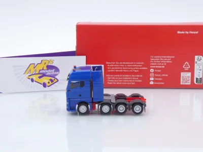 Preview: Herpa 316965-003 # MAN TGX GX 4-achs Schwerlastzugmaschine " Enzianblau " 1:87