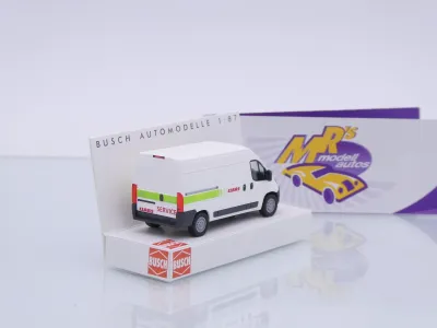 Preview: Busch 54610 # Citroën Jumper Kastenwagen " Claas Traktor Service " 1:87