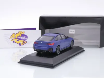 Preview: Minichamps 410024001 # BMW i4 M50 Limousine Baujahr 2022 " mattblaumetallic " 1:43