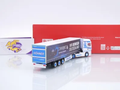 Preview: Herpa 320320 # MAN TGX GX Gardinenplanen-Sattelzug " Spedition Höhner " 1:87