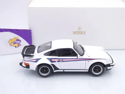 Preview: Norev 187668 # Porsche 911 930 Turbo 3.3 Baujahr 1980 " weiß-blau-rot " 1:18