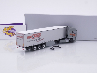 Preview: Herpa 952361 # MAN TGX GX Gardinenplanen-Sattelzug " KM Cargo Logistik & Spedition " 1:87