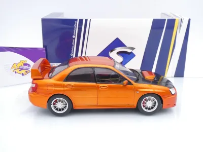 Preview: Solido S1812304 # Subaru Impreza WRX STI Baujahr 2003 " orangemetallic-schwarz " 1:18
