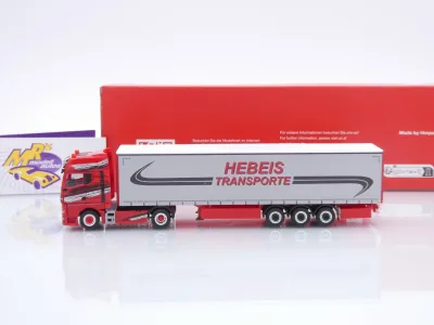 Preview: Herpa 320498 # MAN TGX GX Gardinenplanen-Sattelzug " Hebeis Transporte " 1:87