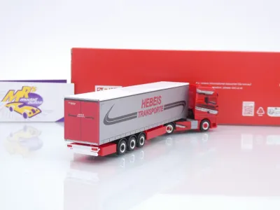 Preview: Herpa 320498 # MAN TGX GX Gardinenplanen-Sattelzug " Hebeis Transporte " 1:87