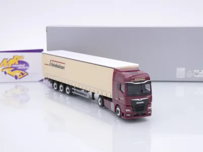 Preview: Herpa 962216 # MAN TGX GX Gardinenplanen-Sattelzug " Schönholzer Trans " 1:87