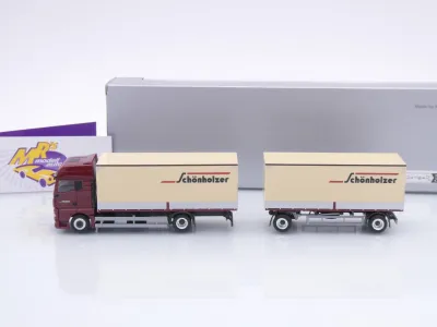 Preview: Herpa 962223 # MAN TGX GX Koffer-Hängerzug " Schönholzer Transport " 1:87