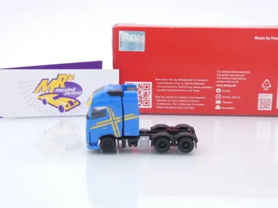 Preview: Herpa 318624-003 # Volvo FH 16 GL 6x4 3-achs Schwerlastzugmaschine " hellblau-gelb " 1:87