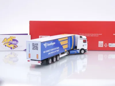 Preview: Herpa 320924 # Mercedes-Benz Actros Gardinenplanen-Sattelzug " Saudingos / Litauen " 1:87