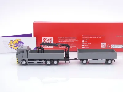 Preview: Herpa 320825 # MAN TGX GN Pritschen-Hängerzug mit Ladekran " grau " 1:87