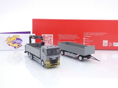 Preview: Herpa 320825 # MAN TGX GN Pritschen-Hängerzug mit Ladekran " grau " 1:87