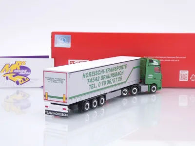 Preview: Herpa 320856 # Mercedes-Benz Actros Gardinenplanen-Sattelzug " Horeischi Transporte " 1:87