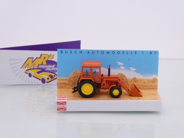 Preview: Busch 51315 # Belarus MTS-82 Frontladertraktor mit Schaufel Baujahr 1983 " orange " 1:87
