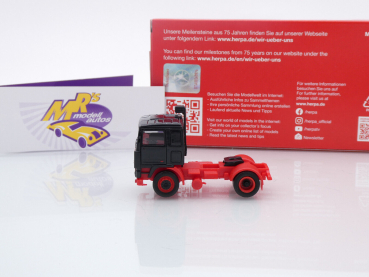Preview: Herpa 956567 # Volvo F10 2-achs Zugmaschine Baujahr 1983 schwarz-rot " 75 Jahre Herpa " 1:87