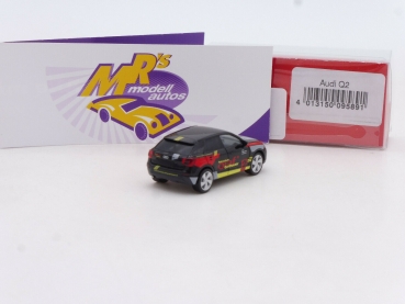 Preview: Herpa 095891 # Audi Q2 schwarz-rot " Fahrschule Olaf Grosshauser " 1:87