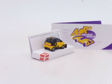 Preview: Busch 46148 # Smart Fortwo 07 mit Schneeschieber " gelb-schwarz " 1:87