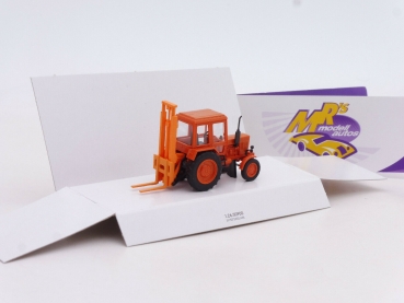 Preview: Busch 51313 # Belarus MTS-80 mit Hecklift TVE 3200 Baujahr 1990 " orange " 1:87