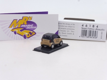 Preview: Busch 46184 # Smart Fortwo Baujahr 2007 gold-schwarz " Zirkus Roncalli " 1:87