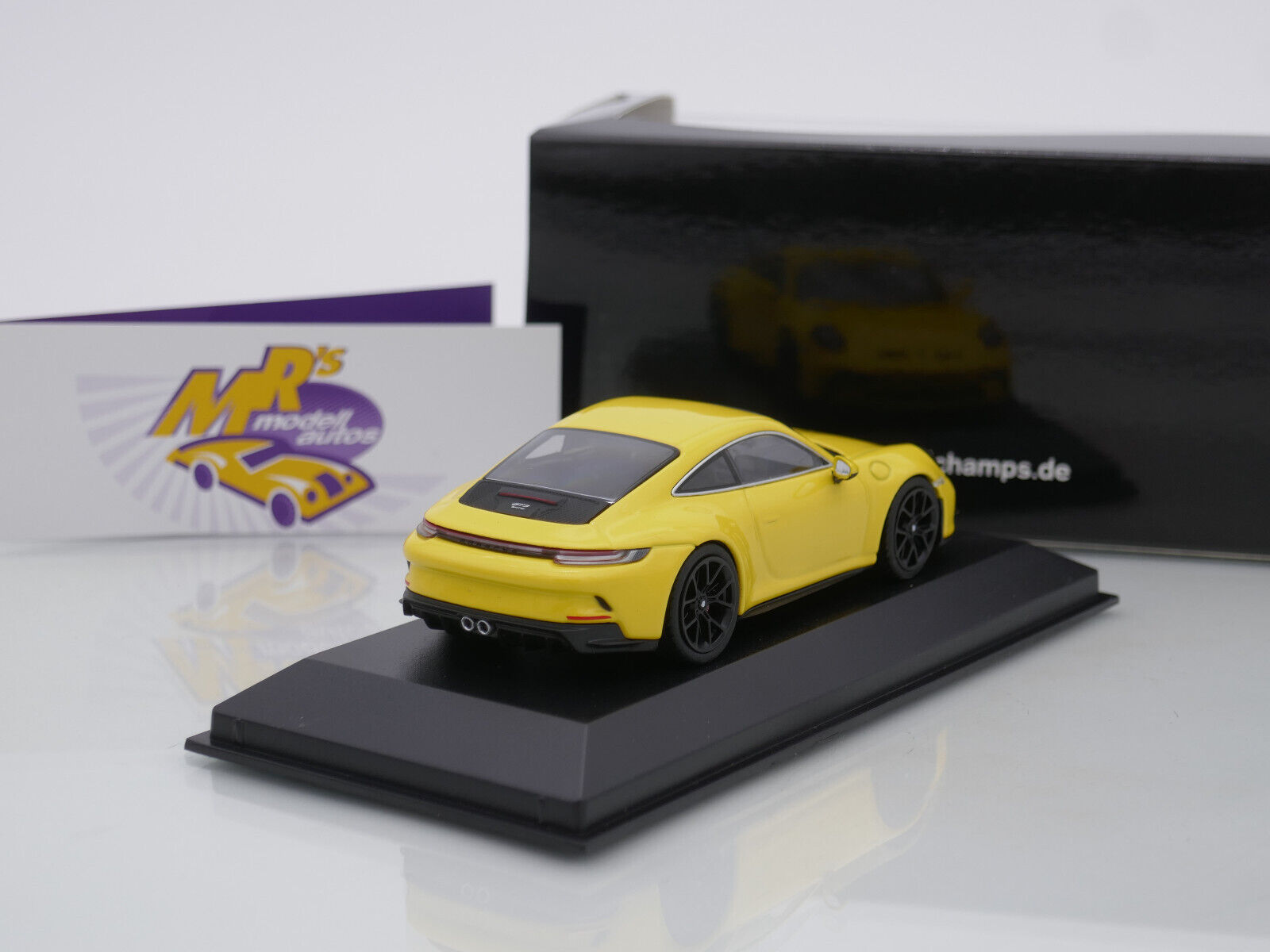 Porsche 911 (992) GT3 Touring Racing Yellow 1:43 410069601 MINICHAMPS